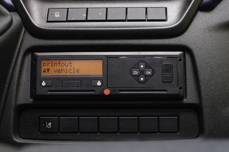 Digital tachograph display reads Printout Vehicle. No personal data. Tachograph in a van.の写真素材