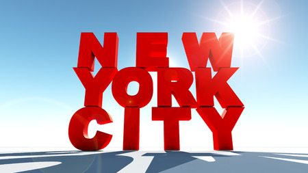Inscription New York City in beams of a bright sun against the blue sky.の写真素材