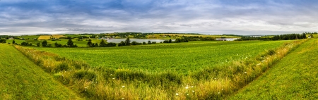 Panoramic hdr coutry view of a lake and fields in Prince Edward Island Canadaの写真素材