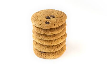 stacked oatmeal cookies with chocolate.の写真素材