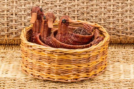 Wicker baskets on white background family, ducklings, fun branches, handmadeの写真素材