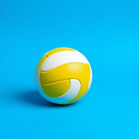 Volleyball ball isolated on blue background. Minimal summer concept.の素材