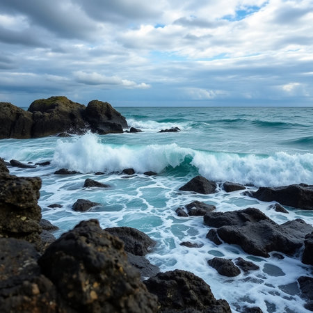 Beautiful seascape with waves breaking on the rocky shore.の素材