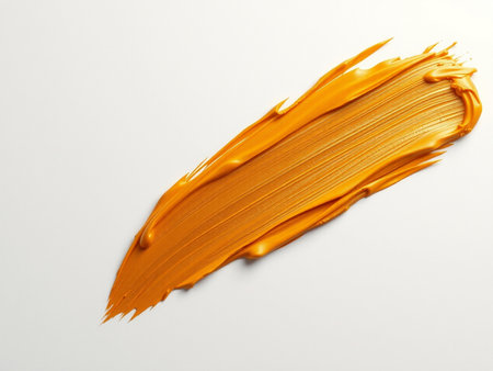 Orange paint brush stroke isolated on white background. 3d render illustrationの素材