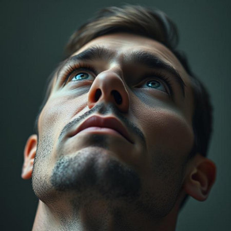Close-up portrait of a handsome man looking up. Men's beauty, fashion.の素材