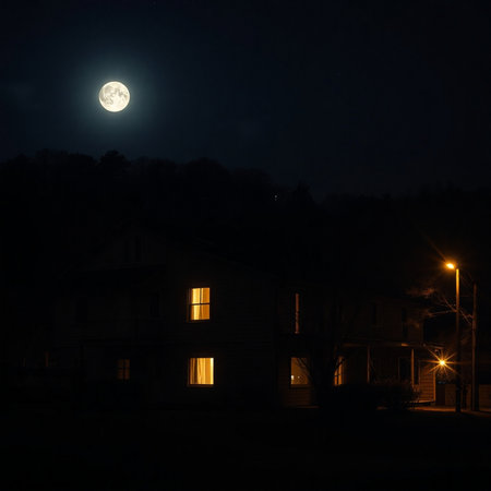 Night landscape with a full moon on the background of an old houseの素材