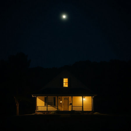 House in the woods at night with a full moon in the backgroundの素材