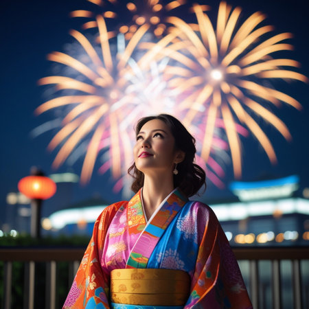 Beautiful asian woman in kimono with fireworks at nightの素材