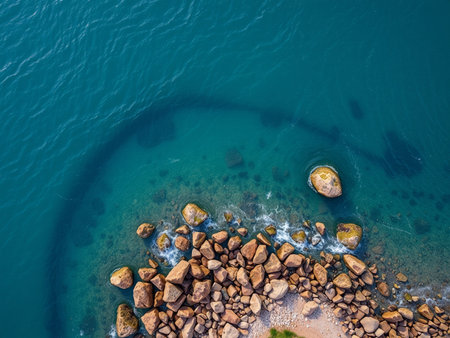 Aerial view of the sea and rocks in the water. Natural backgroundの素材