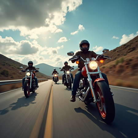 Motorcyclists riding on the road in the mountains. Biker journey.の素材