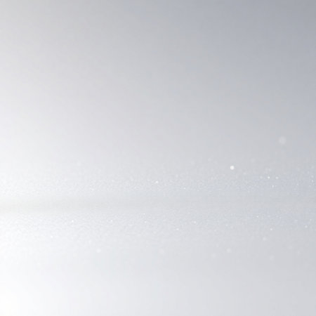 white abstract background with some smooth lights and sparkles on the surfaceの素材
