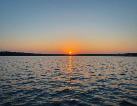 Sunset on the lake. Beautiful summer landscape. Sunset on the lake.の素材