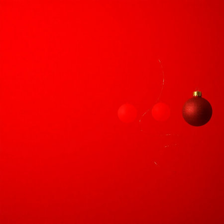 Christmas balls on a red background. New Year card. Copy space.の素材