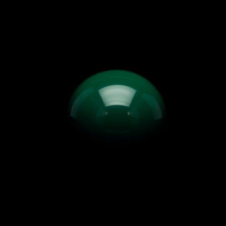 green glass ball on a black background. macro photo. blur.の素材