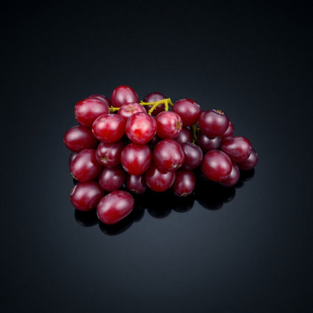 Red grape isolated on black background with clipping path. Grapes on black background.の素材