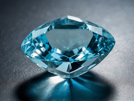 Blue diamond on a dark background. Shallow depth of field.の素材