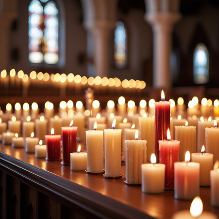Burning candles in a church. Religion concept. Closeup.の素材