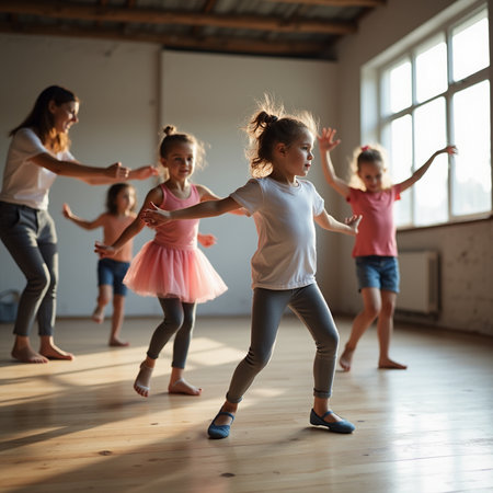Group of children dancing modern hip hop at dance studio. Group of little girls having fun together.の素材