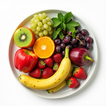 Fruits and berries in a plate on a white background, top viewの素材