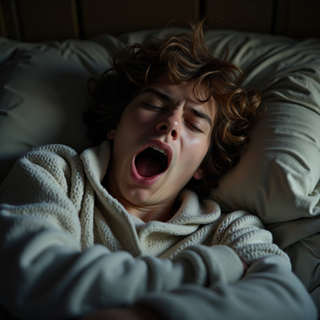 sick young woman lying in bed at night. High quality photoの素材
