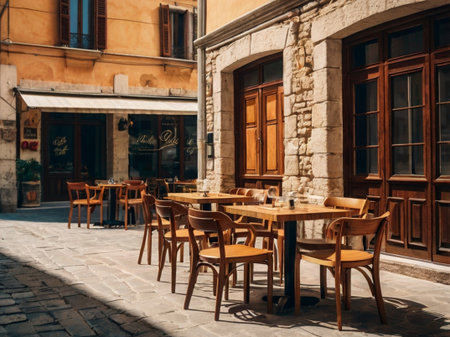 Tables and chairs in a street cafe in Rovinj, Croatiaの素材