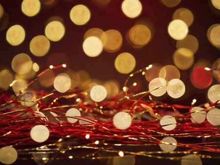 Christmas background with bokeh lights and red ribbons, shallow depth of fieldの素材