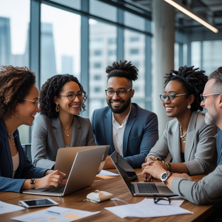 Group of diverse business people working together in modern office. Multiethnic group of business people using laptop and tablet computer.の素材