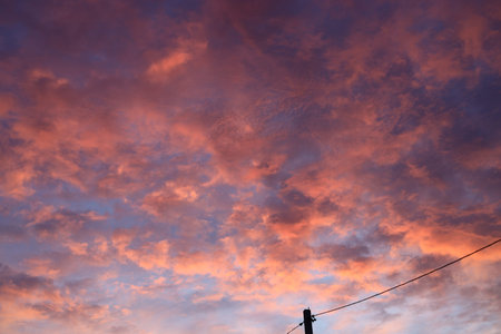 Sky with clouds at sunset. Nature background. Sky with clouds at sunset.