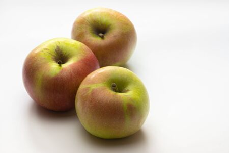 A ripe Apple shot from above on a white backgroundの写真素材