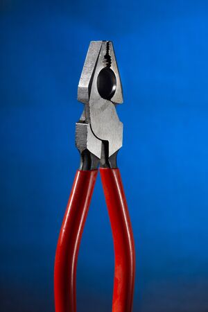 pliers for locksmiths on a blue backgroundの写真素材