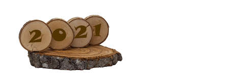 Happy new year 2021. Numbers 2021 with a wood texture, on an isolated White background. New years holiday concept, copyspace, bannerの写真素材