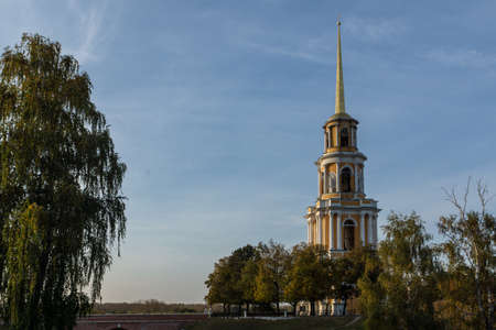 Orthodox white-Stone Church on the background of a beautiful sunsetの写真素材