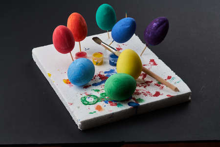 easter eggs are natural and artificial in different colors.creativity with children, traditional symbolsの写真素材