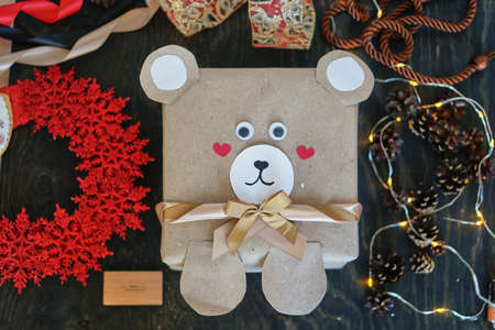 Gift for a child. Gift wrapping for children. New Years decor. Bear box.の写真素材