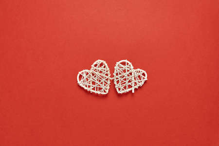Two white homemade hearts background. Love symbol, romantic background. Valentines day holiday gift cardの写真素材
