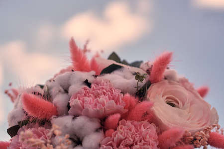 Pink bridal bouquet. Peonies, cotton, composition of flowers.の写真素材