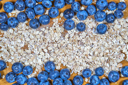 Blueberries and bunting background. snack. muesli. plate heart. with love.の写真素材