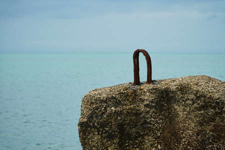 Breakwater on beach. Ocean beach breakwaters. Old concrete blocks Campi.の写真素材