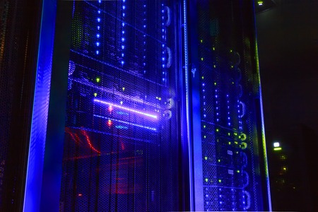 mainframe in dark room with illumination from the server hardwareの写真素材