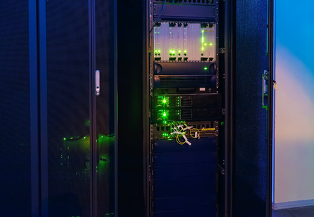 rack with telecommunications network equipment in  data centerの写真素材