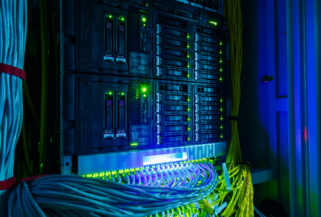 Network switch and UTP ethernet cables close-up in  server roomの写真素材