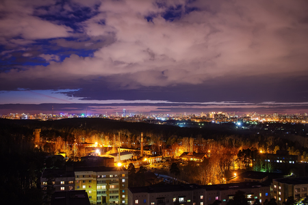 sunset over Yekaterinburg dusk night lights cloudyの写真素材