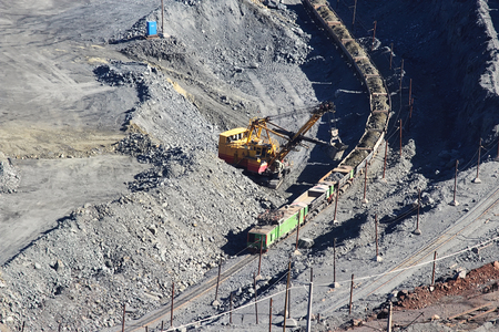 huge quarry iron ore mining in Gubkin Russian springの写真素材