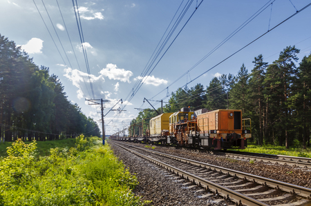 special transport on railway in the nature sunny summerの写真素材