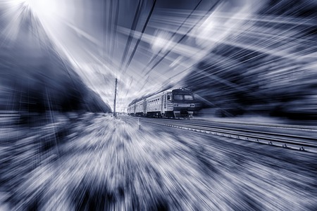 fast electric train movement blur countryside abstract motion blurの写真素材