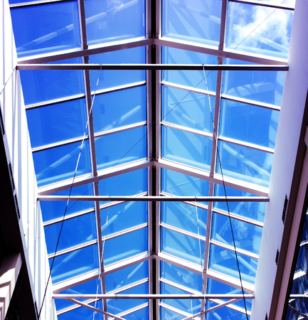 glass roof shopping center with blue sky summerの写真素材