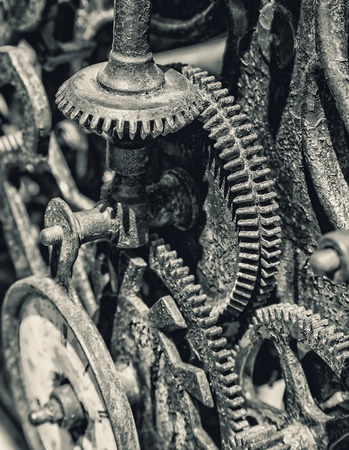 Close-up of an ancient gears metal mechanismの写真素材