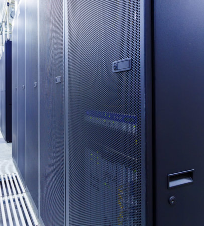 room with rows of server hardware in data center