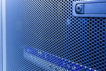 Abstract of modern high tech internet data center room with rows of racks with network and server...