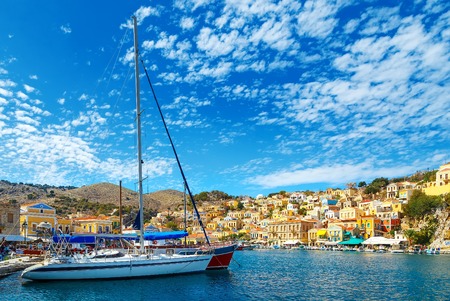 yacht and houses on symi island, Greeceの写真素材